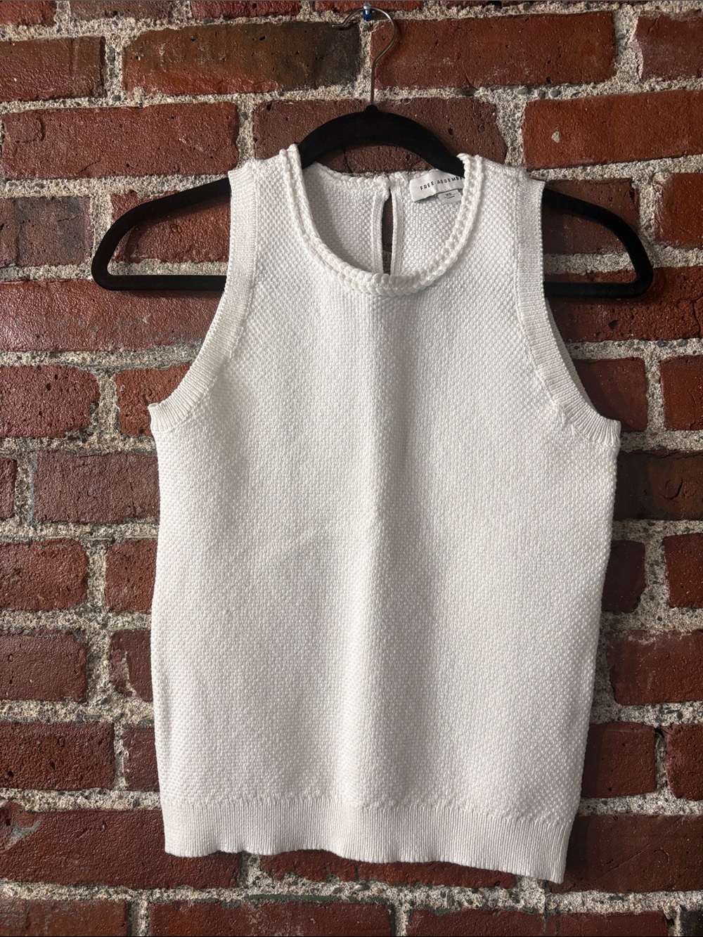 Sleeveless White Knit Shell Top